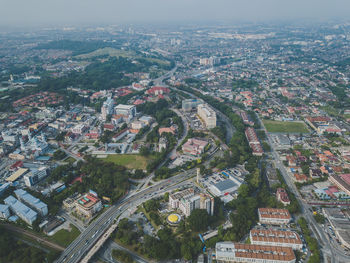 Aerial view of cityscape against sky