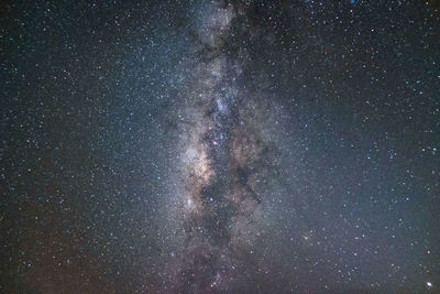 Low angle view of star field sky at night