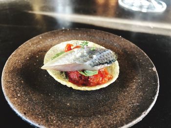 High angle view of bread in plate on table