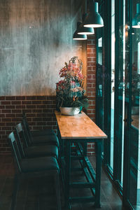 Woman sitting on chair in restaurant