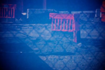 Digital composite image of illuminated building at night