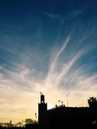 Low angle view of built structure against blue sky