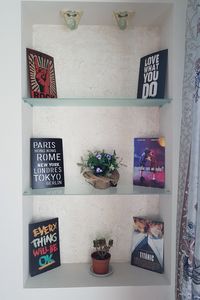 High angle view of potted plants on wall