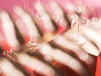 Full frame shot of pink shoes hanging on for sale