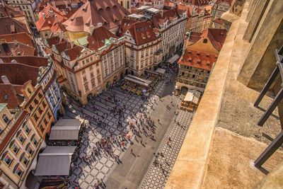 High angle view of crowd on road amidst buildings