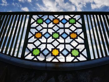 Low angle view of window against sky