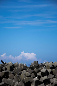 Low angle view of building against cloudy sky