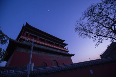 Low angle view of built structure against blue sky