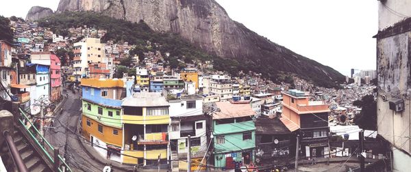 High angle view of buildings in town against sky