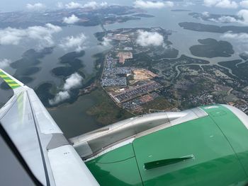 Aerial view of sea and cityscape