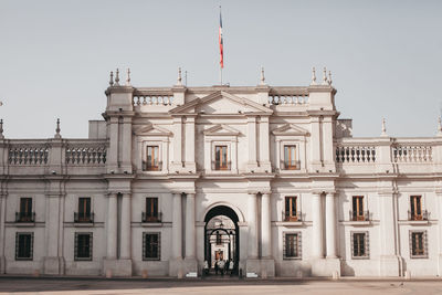 Facade of historic building against sky