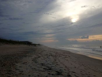 Scenic view of beach against sky