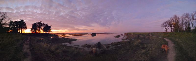 Panoramic view of landscape against sky during sunset