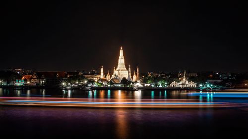 Illuminated buildings at waterfront