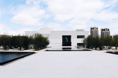 Modern building against sky in city