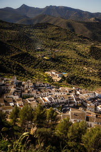 High angle view of townscape and mountains