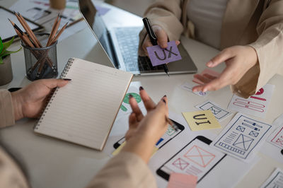 Cropped image of business colleagues working in office