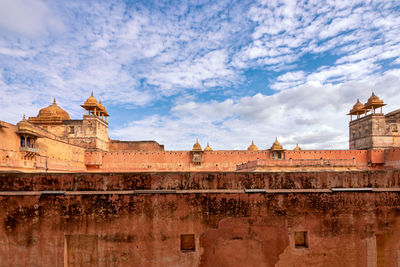 Exterior of historic building against sky