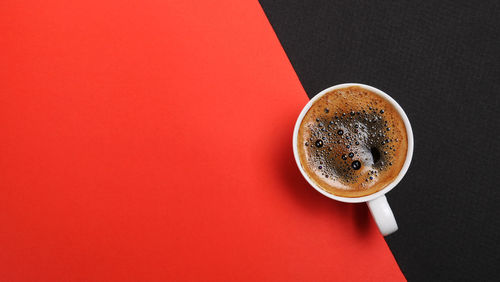 High angle view of coffee cup on table