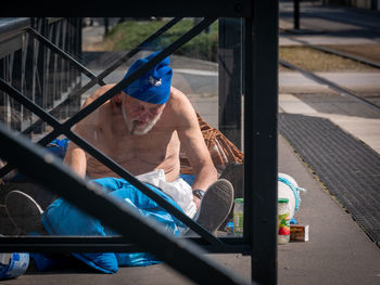 Portrait of man sitting in bus