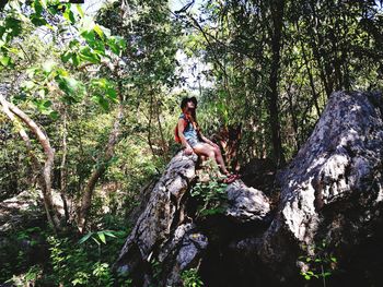 Portrait of woman on tree