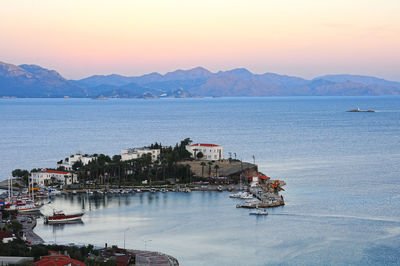 High angle view of boats in sea against sky