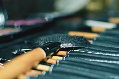 Close-up of piano keys on table