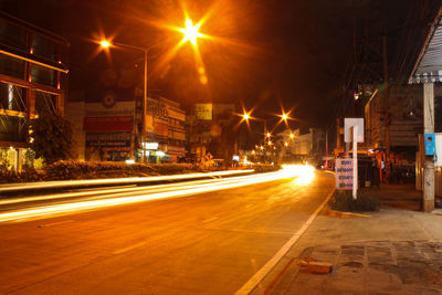 Light trails on city street at night