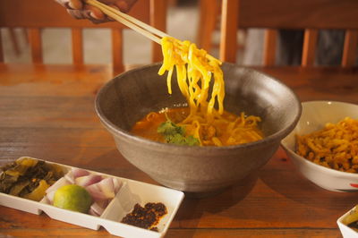 High angle view of chopped vegetables in bowl on table