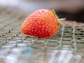 Close-up of strawberry on table