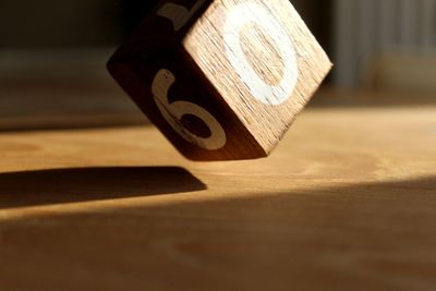 Close-up of piano on table