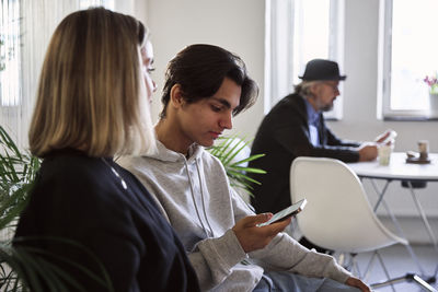 People sitting in waiting room