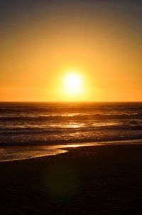 Scenic view of sea at sunset