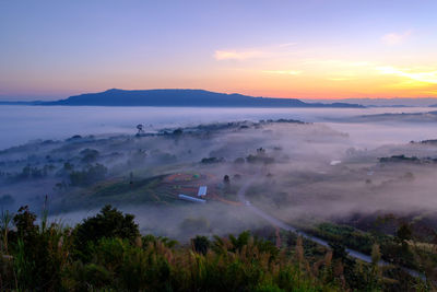 High angle view of landscape against sky during sunset