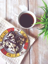 High angle view of coffee cup on table
