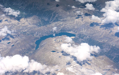 High angle view of snowcapped mountain against sky