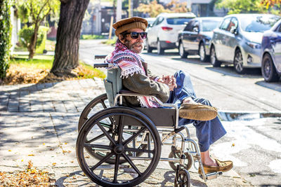 Man sitting on cart