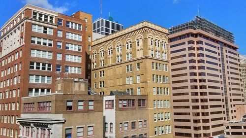 Low angle view of buildings against sky