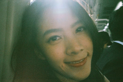 Portrait of smiling young woman