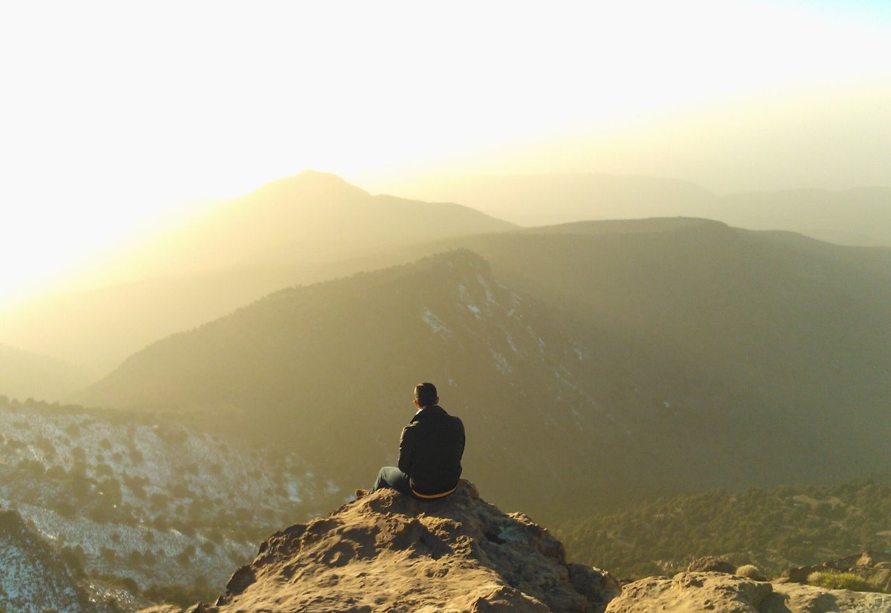 mountain, mountain range, landscape, nature, one person, hiking, beauty in nature, sunset, outdoors, people, fog, adults only, one man only, adult, sky, day