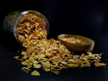 High angle view of food on table against black background