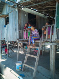 Women sitting on table