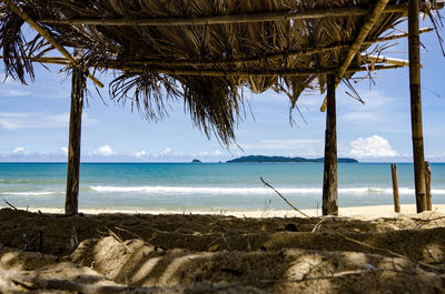 View of calm beach against the sky