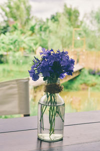 Close-up of flower vase on table