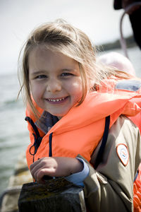 Portrait of girl wearing life vest