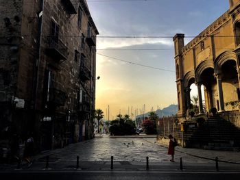 People walking on street in city