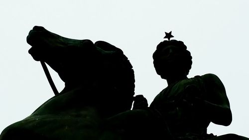 Low angle view of statue against clear sky