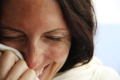 Close-up of woman with eyes closed