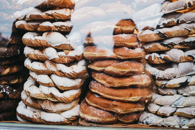 Stack of bread for sale at store