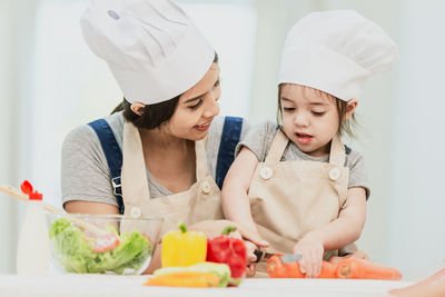 Happy friends looking away